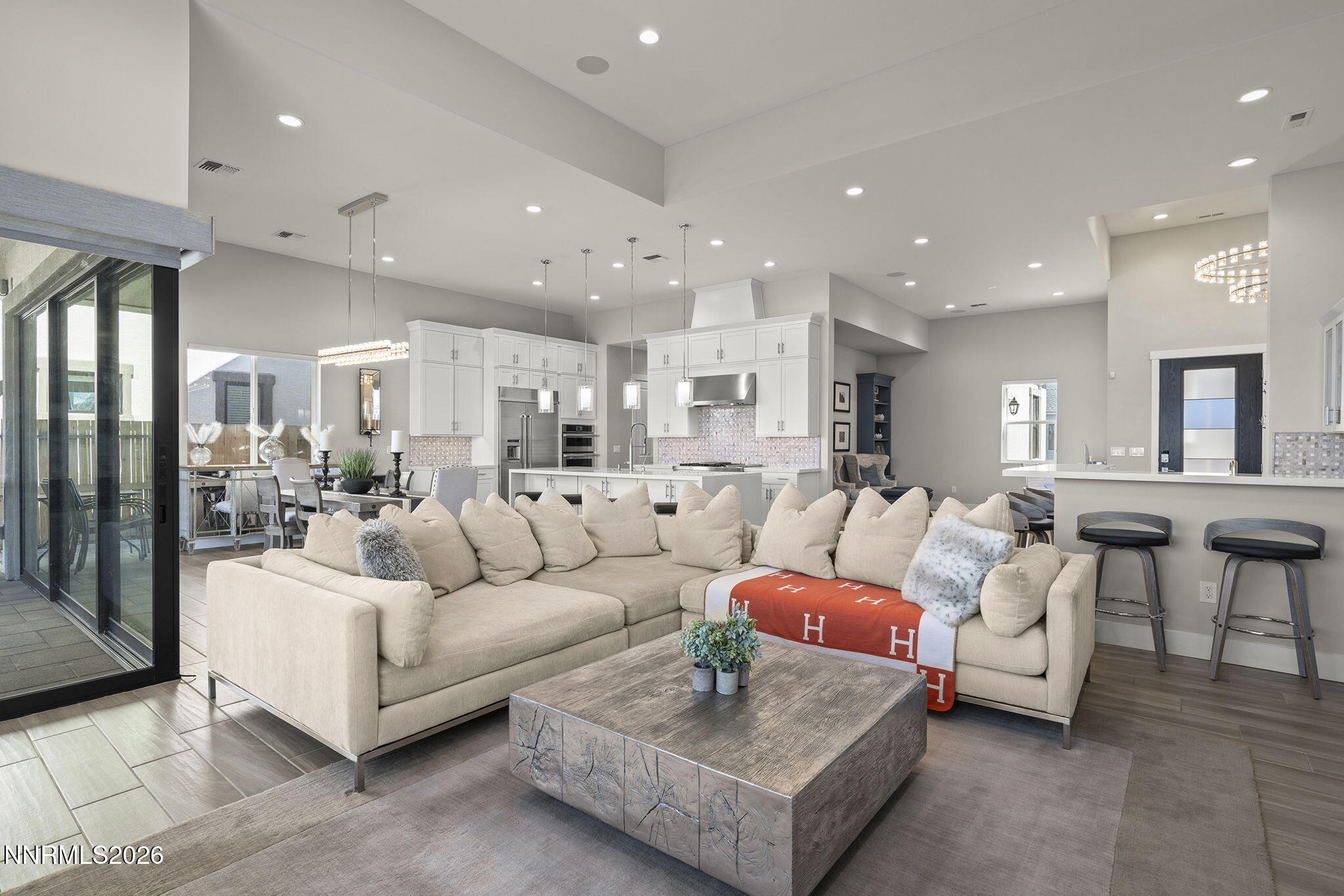 2945 Ruby Desert Drive Reno, NV 89521 - Photo 12 of 41 a living room with furniture and a large mirror