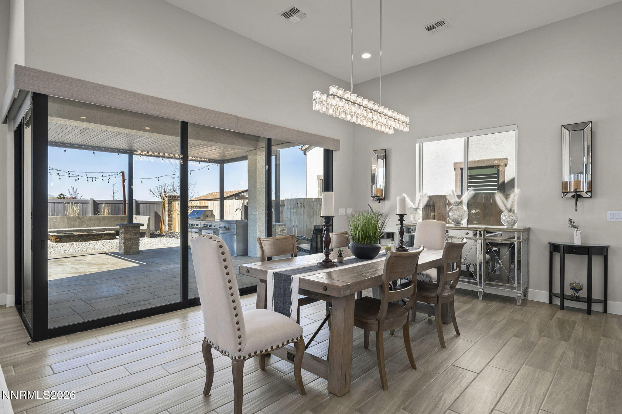 2945 Ruby Desert Drive Reno, NV 89521 - Photo 19 of 41 a view of a dining room with furniture window and wooden floor
