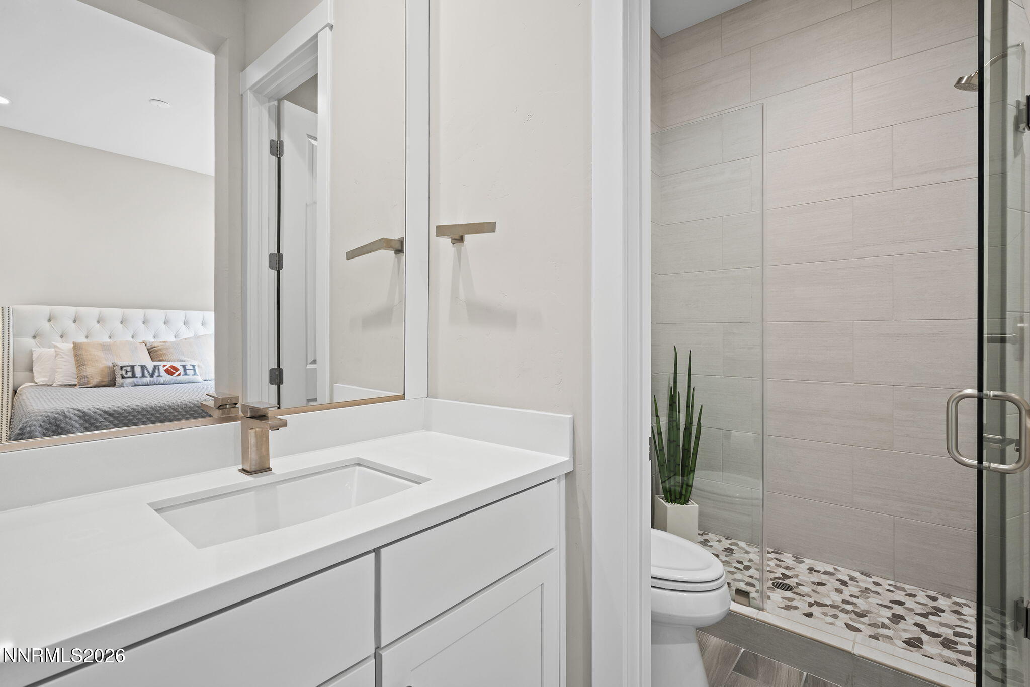2945 Ruby Desert Drive Reno, NV 89521 - Photo 28 of 41 a bathroom with a sink a toilet and shower