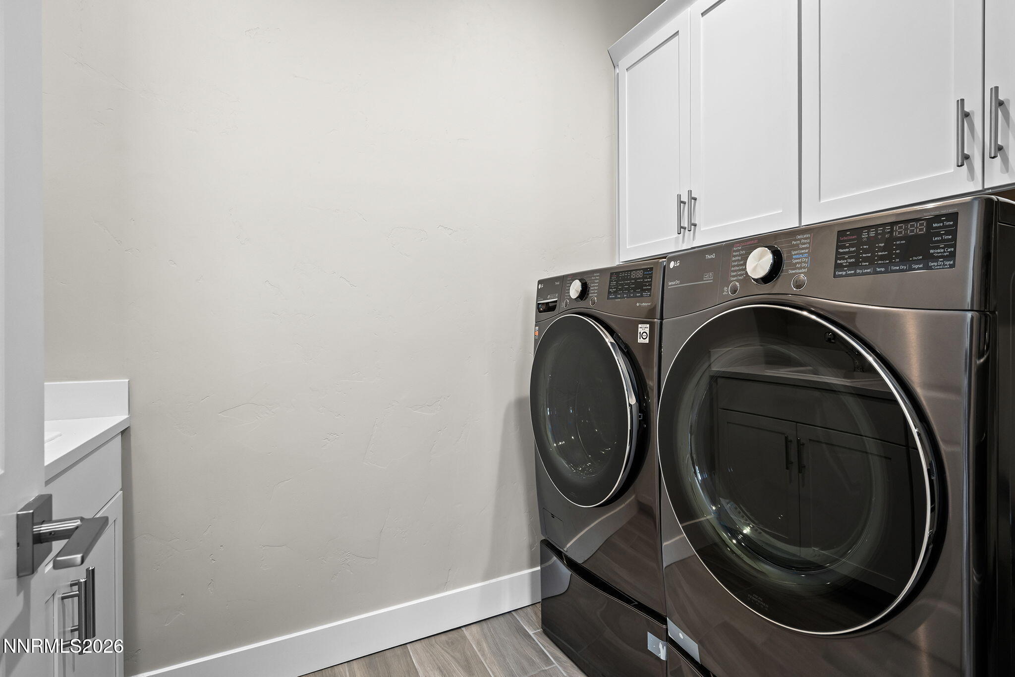 2945 Ruby Desert Drive Reno, NV 89521 - Photo 34 of 41 a utility room with dryer and washer