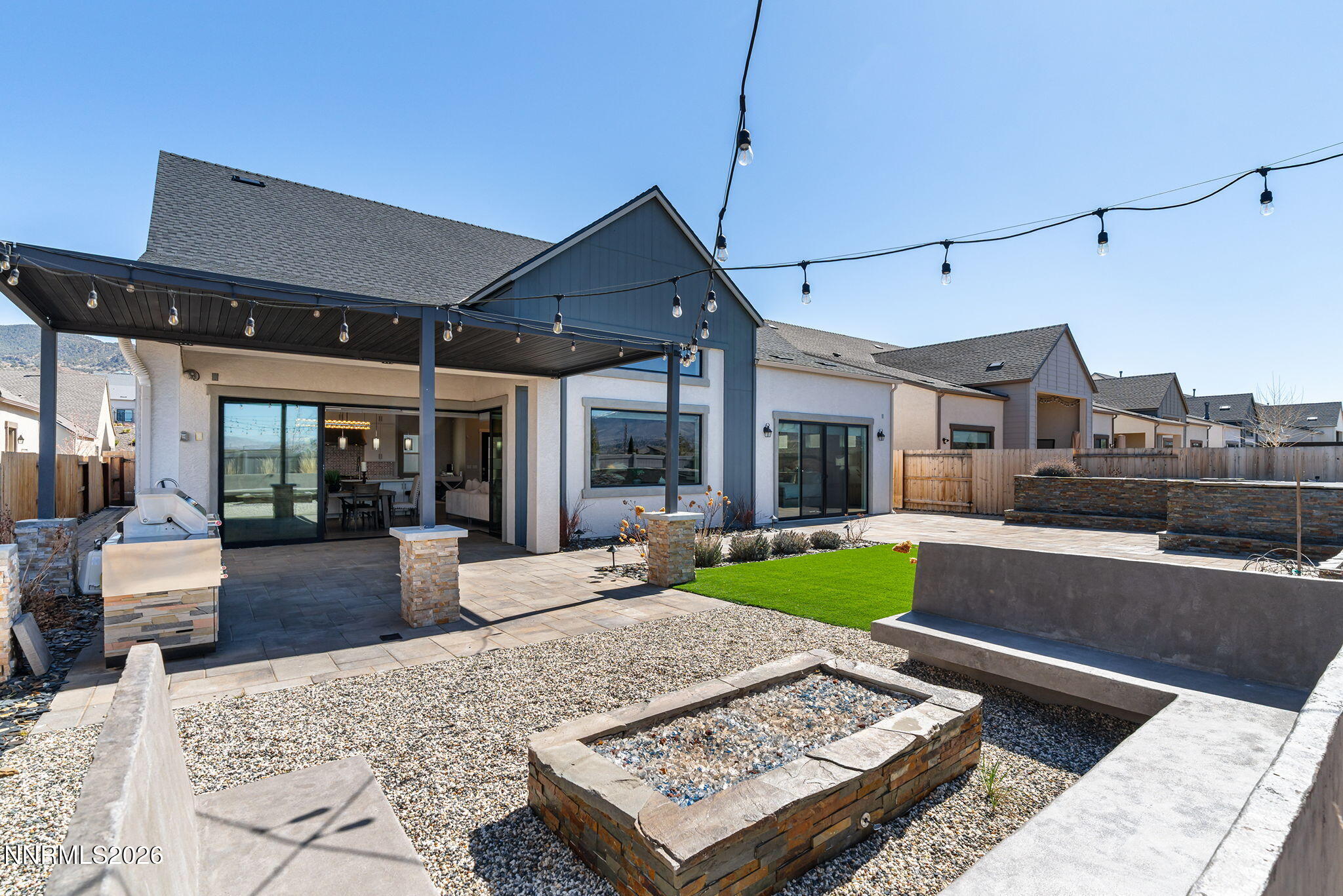2945 Ruby Desert Drive Reno, NV 89521 - Photo 35 of 41 a view of a patio with chairs and tables