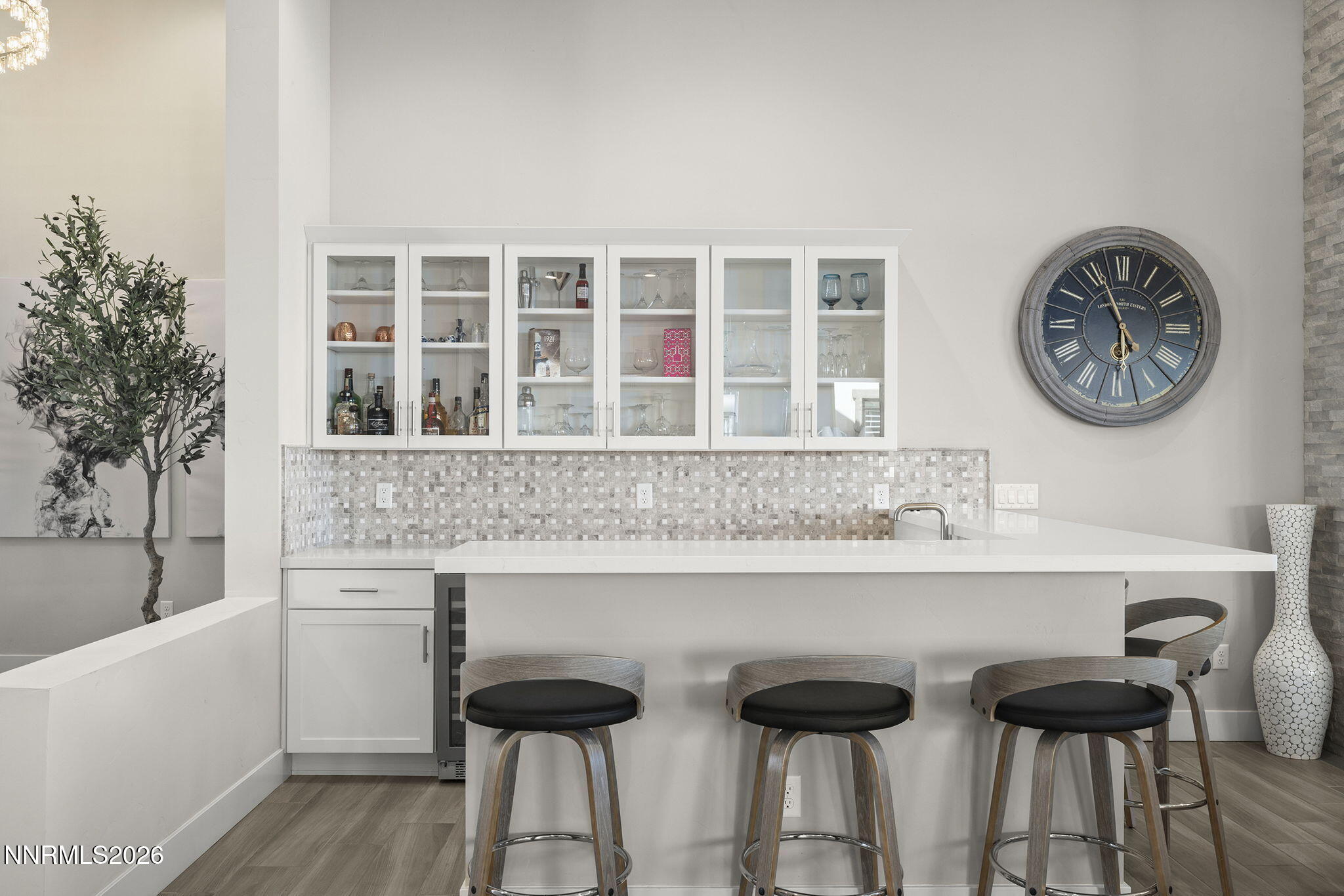 2945 Ruby Desert Drive Reno, NV 89521 - Photo 7 of 41 a view of a kitchen with a sink and chairs