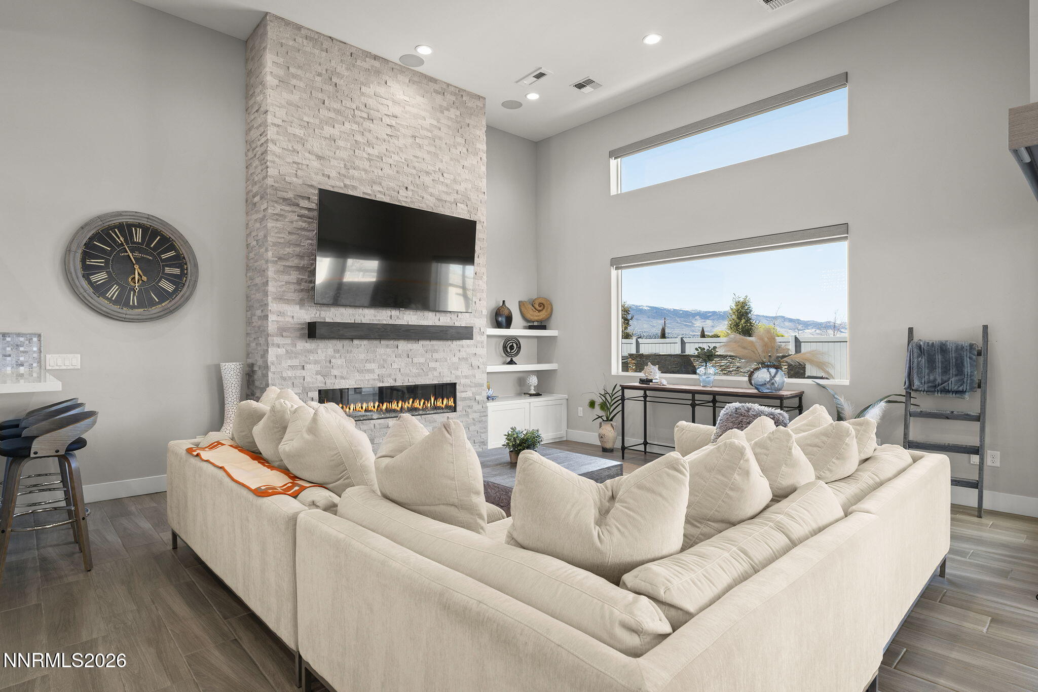 2945 Ruby Desert Drive Reno, NV 89521 - Photo 9 of 41 a living room with furniture and a flat screen tv