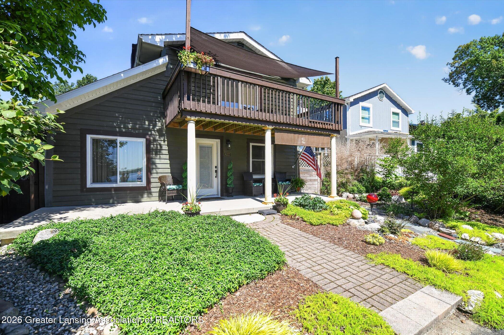 6227 West Reynolds Road Haslett, MI 48840 - Photo 2 of 92 02-6227-W-Reynolds-Rd-WindowStill-Photog