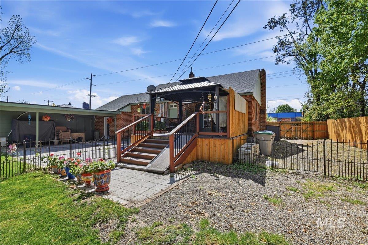 6710 West Ustick Road Boise, ID 83704 - Photo 38 of 42 Expansive deck with a covered gazebo and ramp access