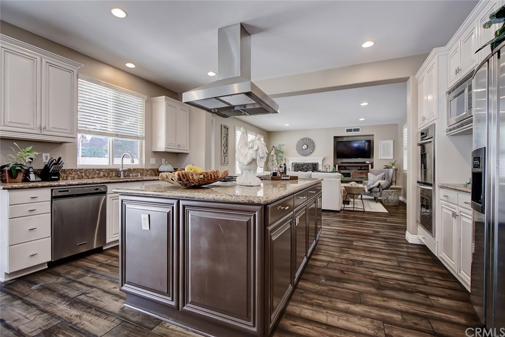 2911 Hawk Pointe Drive Fullerton, CA 92833 - Photo 25 of 55 Main Floor Kitchen Area with Open Access to Adjacent Family Room.