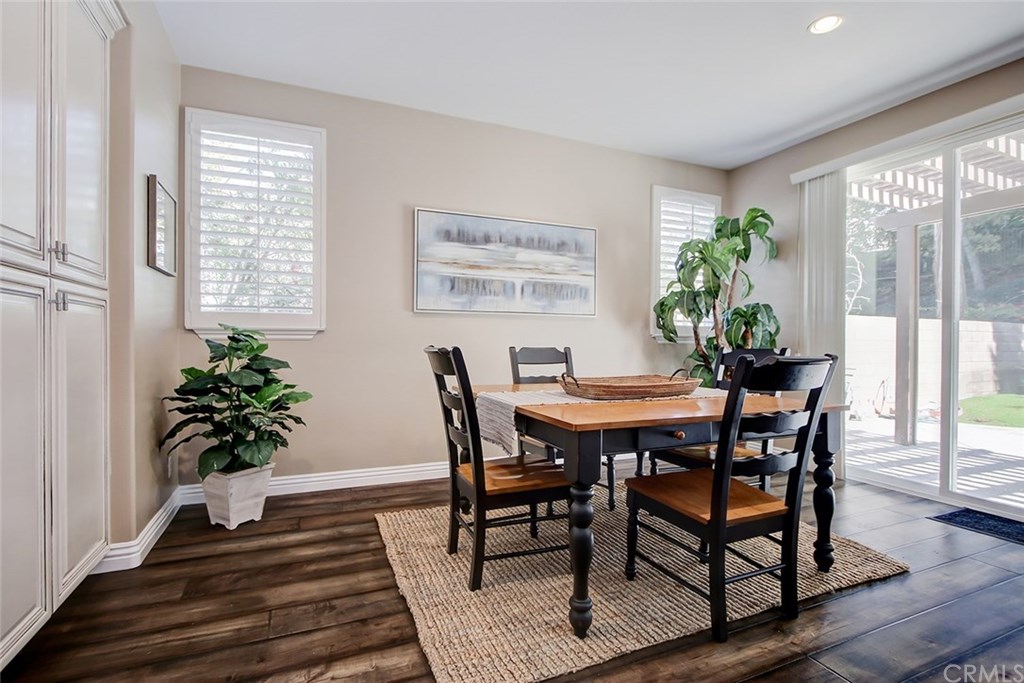 2911 Hawk Pointe Drive Fullerton, CA 92833 - Photo 26 of 55 Breakfast Nook Open to Adjacent Main Floor Kitchen Features: Sliding Door Access to Backyard Patio Area, Recessed Lighting, and Hardwood Flooring.