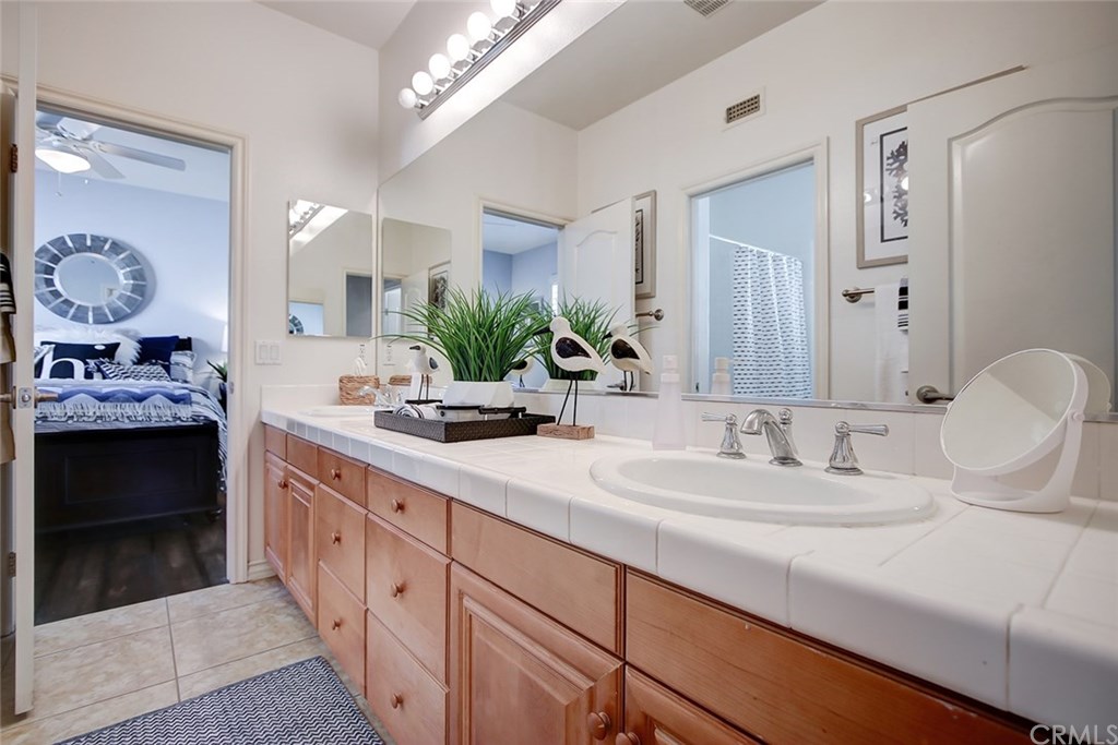2911 Hawk Pointe Drive Fullerton, CA 92833 - Photo 40 of 55 2nd Floor Full Bathroom Features: Dual Sink Tile Countertop,Tile Flooring, Direct Access to Boy's Bedroom, and Hallway Access to 2 Additional Guest Bedrooms.