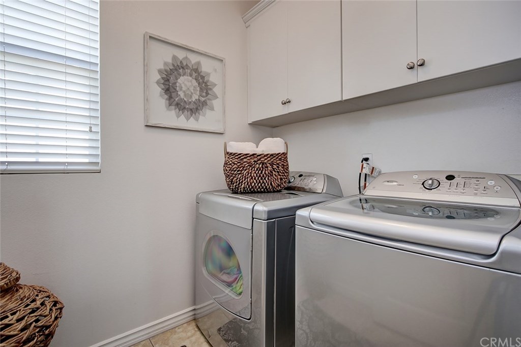 2911 Hawk Pointe Drive Fullerton, CA 92833 - Photo 41 of 55 2nd Floor Laundry Room Features: Overhead Cabinetry and Tile Flooring.