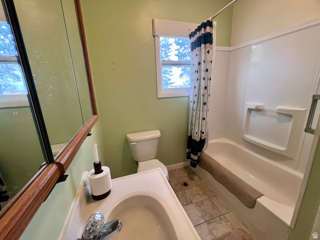 479 East 100 N Road Meadow, UT 84644 - Photo 10 of 59 Bathroom with shower / bath combo, vanity, and light tile patterned flooring