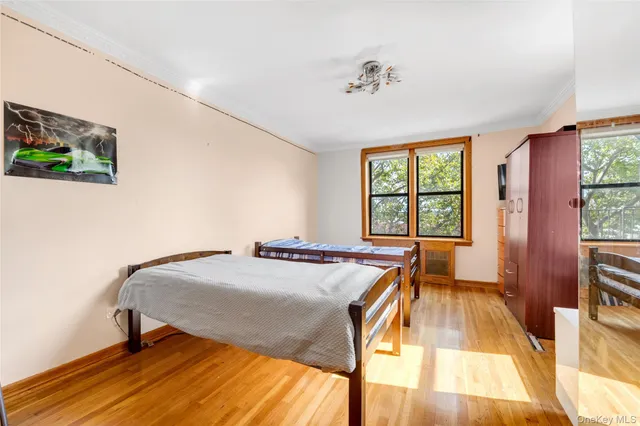 a bedroom with a bed and a table