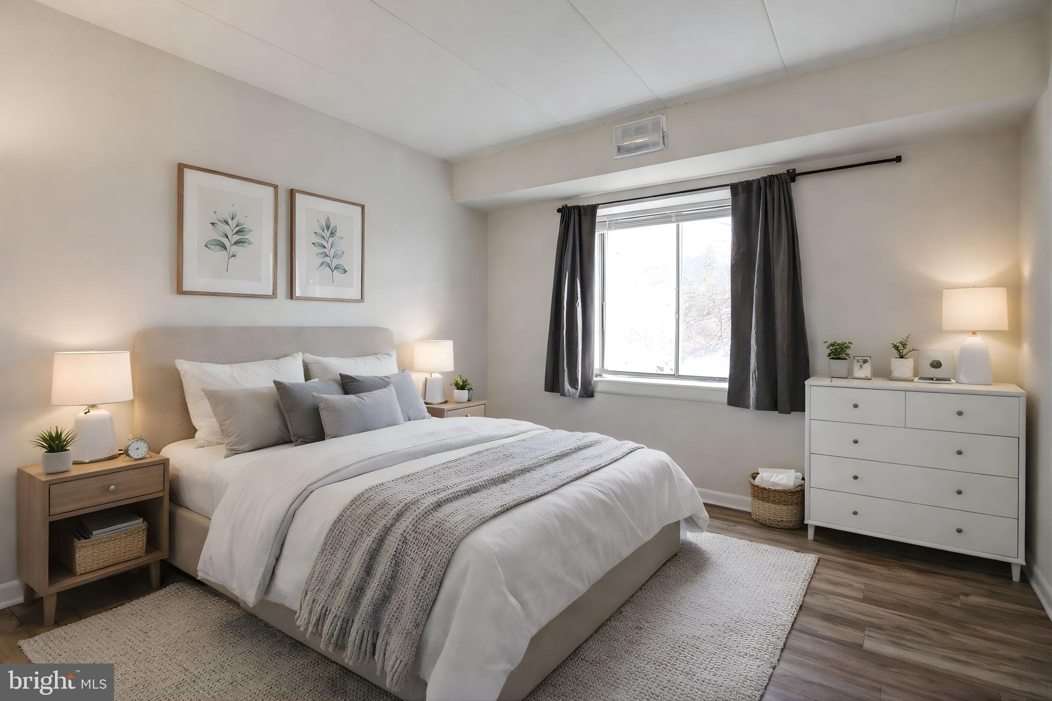 6240 Edsall Road, Unit 202 Alexandria, VA 22312 - Photo 10 of 13 a bedroom with a bed and a dresser