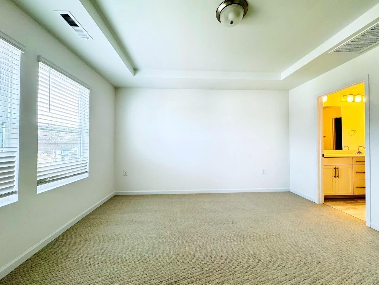 428 Sustainable Way Raleigh, NC 27610 - Photo 13 of 22 a view of an empty room with a window