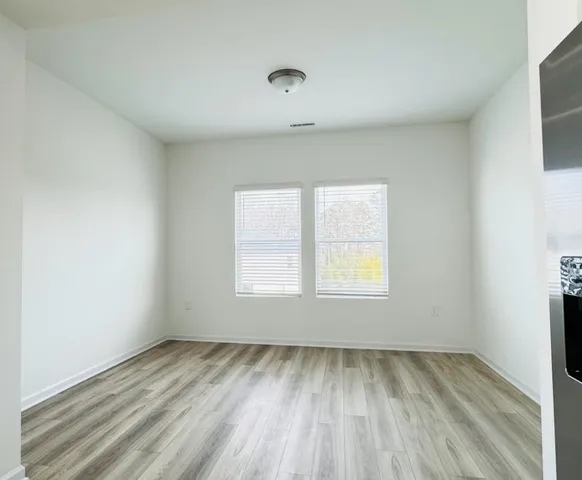 an empty room with a window