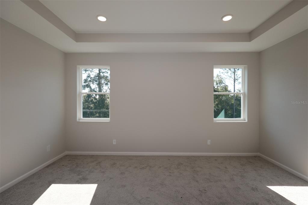 5184 Prairie Preserve Run St. Cloud, FL 34772 - Photo 12 of 36 an empty room with windows