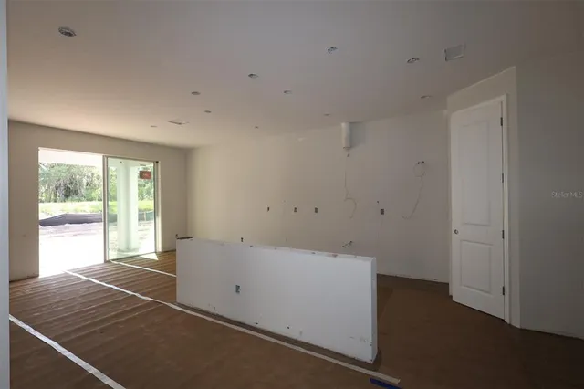 a room with walk in closet and window