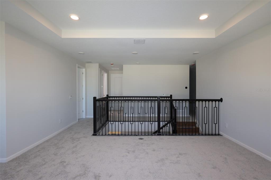 5184 Prairie Preserve Run St. Cloud, FL 34772 - Photo 7 of 36 a view of a hallway