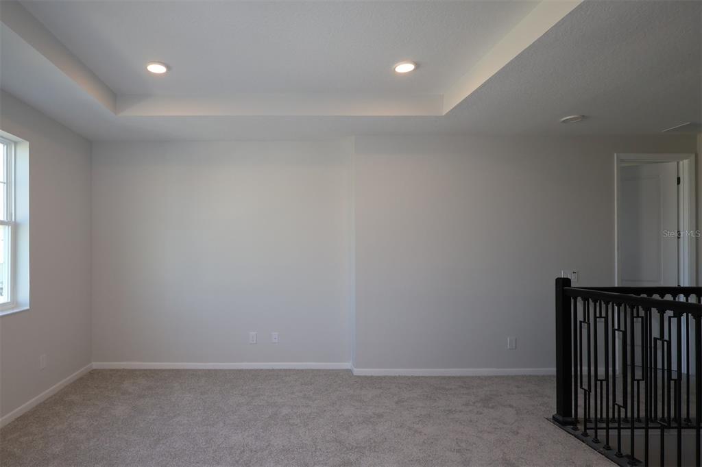 5184 Prairie Preserve Run St. Cloud, FL 34772 - Photo 8 of 36 an empty room with windows