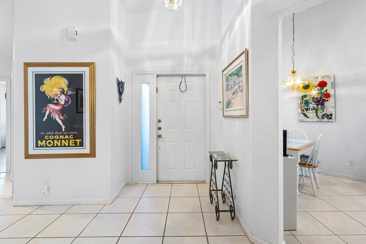 8398 Vía Serena Boca Raton, FL 33433 - Photo 2 of 50 a view of a hallway with workspace