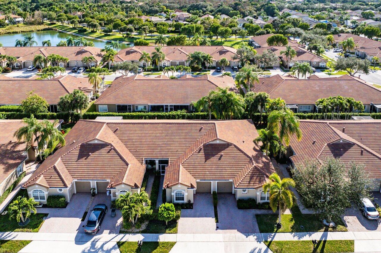 8398 Vía Serena Boca Raton, FL 33433 - Photo 28 of 50 an aerial view of house with yard and ocean view