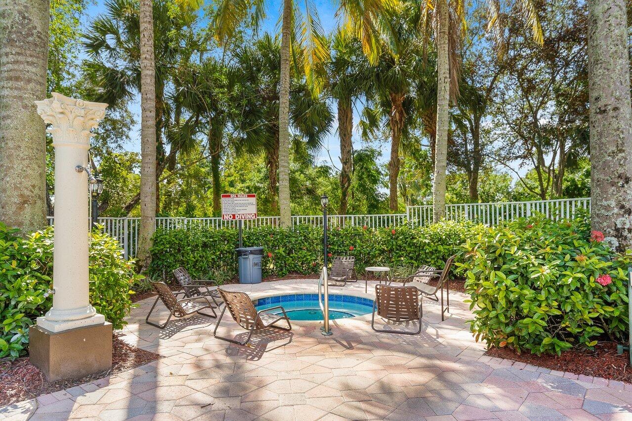 8398 Vía Serena Boca Raton, FL 33433 - Photo 45 of 50 a view of a chair and table in backyard