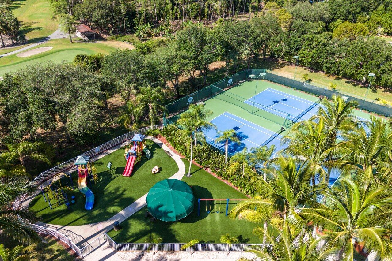 8398 Vía Serena Boca Raton, FL 33433 - Photo 48 of 50 an aerial view of a tennis ground and a large tree