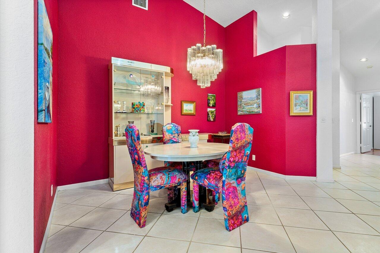 8398 Vía Serena Boca Raton, FL 33433 - Photo 10 of 50 a view of a dining room with furniture