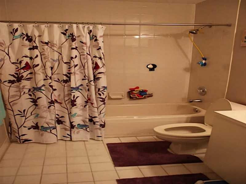 11270 Renaissance Road Cooper City, FL 33026 - Photo 4 of 17 a bathroom with a toilet and a shower
