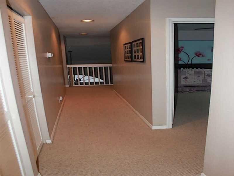 11270 Renaissance Road Cooper City, FL 33026 - Photo 5 of 17 a view of a hallway and interior of the house