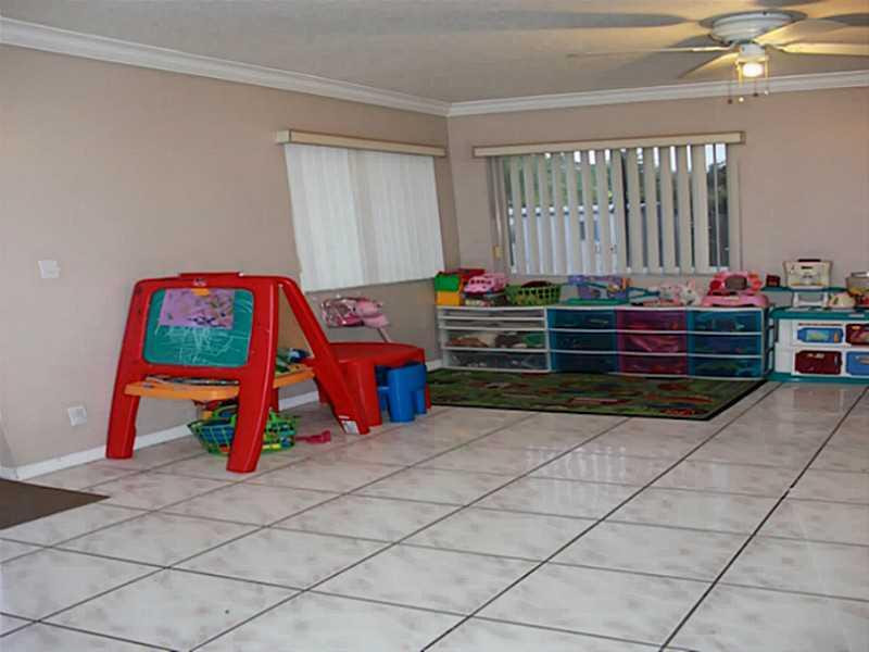 11270 Renaissance Road Cooper City, FL 33026 - Photo 6 of 17 a room with musical instruments