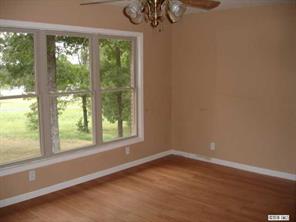 8504 A Smith Road Stanfield, NC 28163 - Photo 3 of 6 a view of a room that has a window in it
