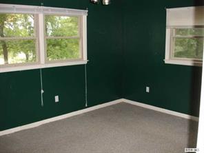 8504 A Smith Road Stanfield, NC 28163 - Photo 4 of 6 a view of an empty room with a window