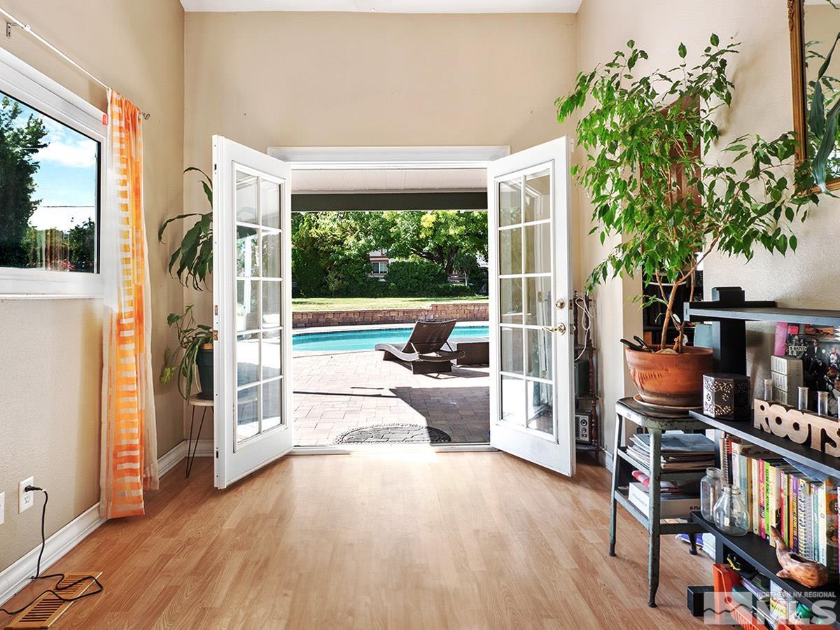 4155 Garlan Lane Reno, NV 89509 - Photo 12 of 24 a view of a porch with furniture and garden