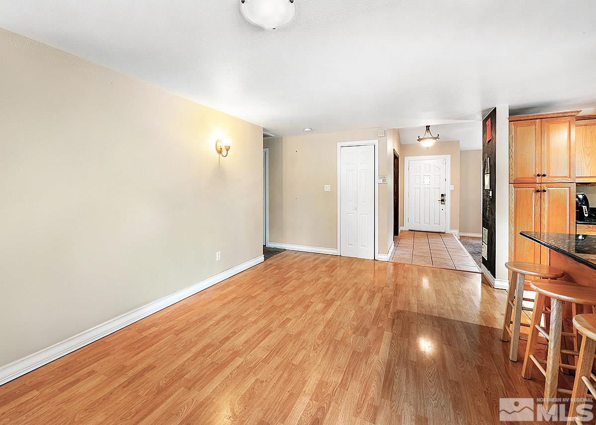 4155 Garlan Lane Reno, NV 89509 - Photo 6 of 24 a view of empty room with wooden floor