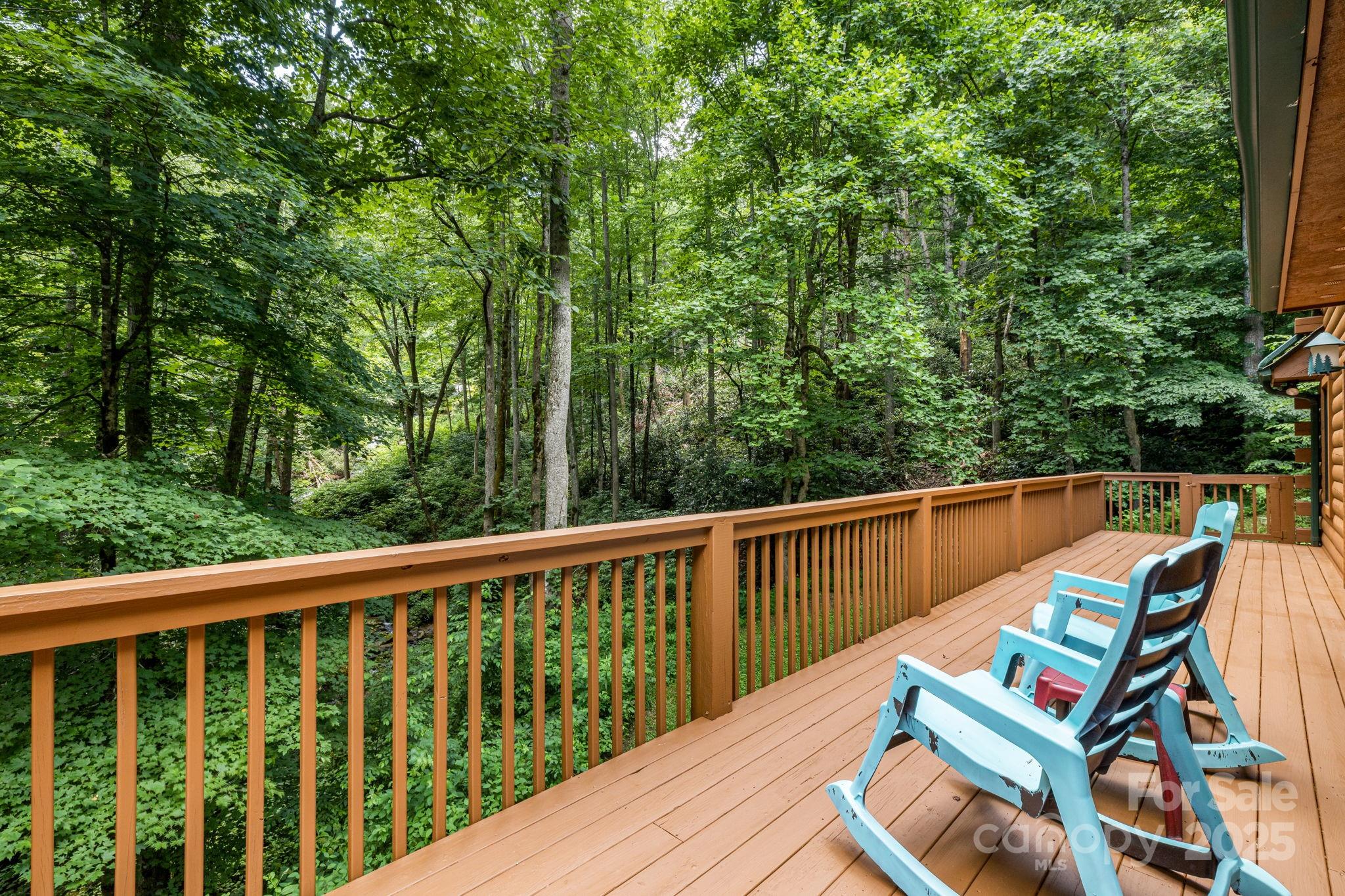 3617 Lonesome Mountain Road Marshall, NC 28753 - Photo 11 of 46 a balcony with wooden floor and outdoor space