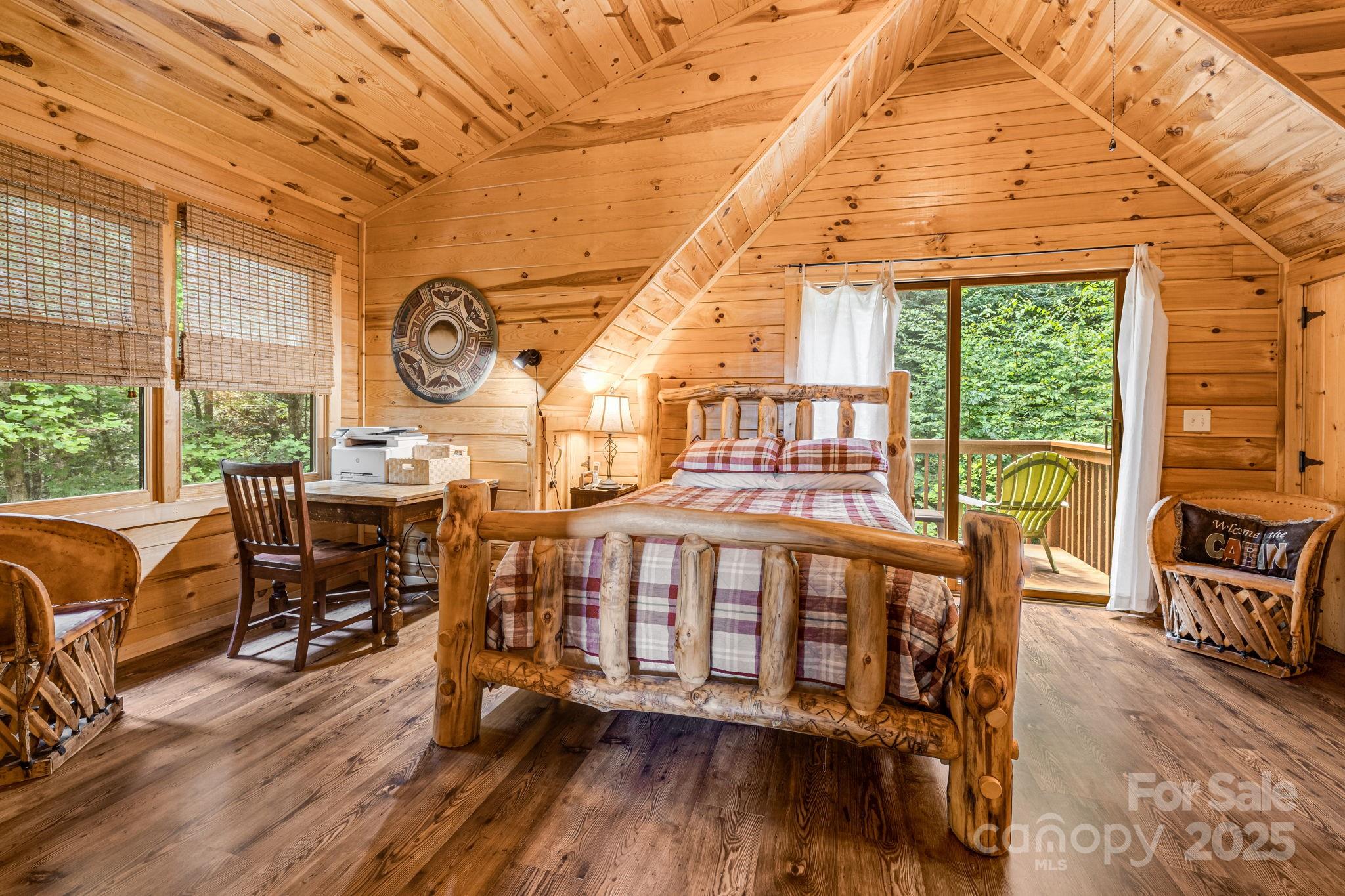 3617 Lonesome Mountain Road Marshall, NC 28753 - Photo 23 of 46 a very nice looking bedroom with a large window