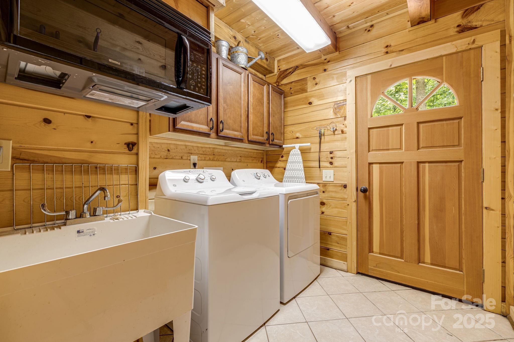 3617 Lonesome Mountain Road Marshall, NC 28753 - Photo 30 of 46 a utility room with dryer and washer