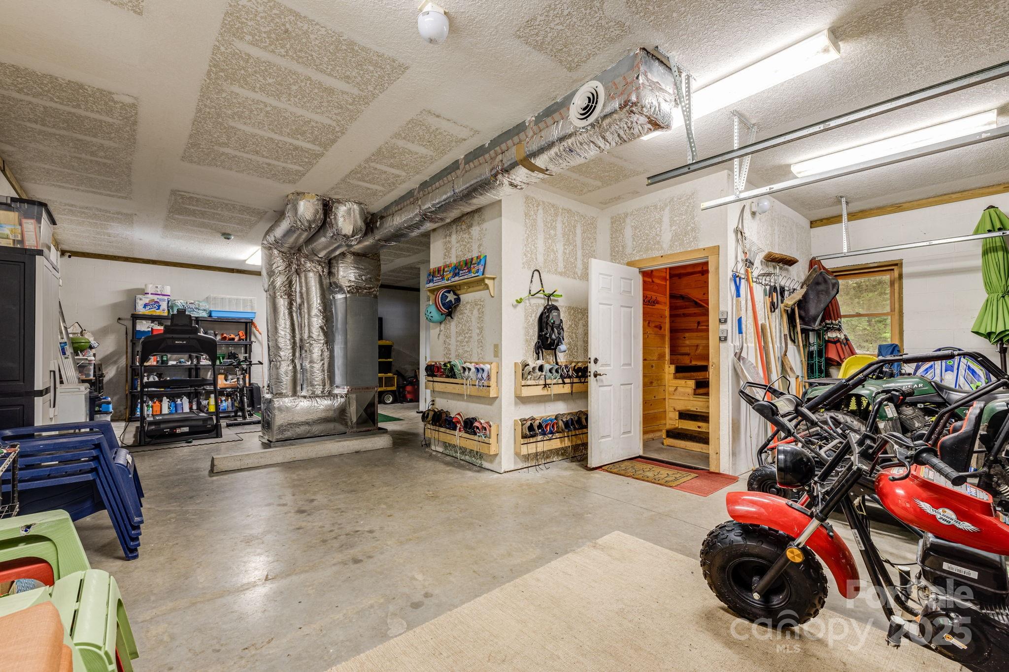 3617 Lonesome Mountain Road Marshall, NC 28753 - Photo 32 of 46 a view of a room with gym equipment