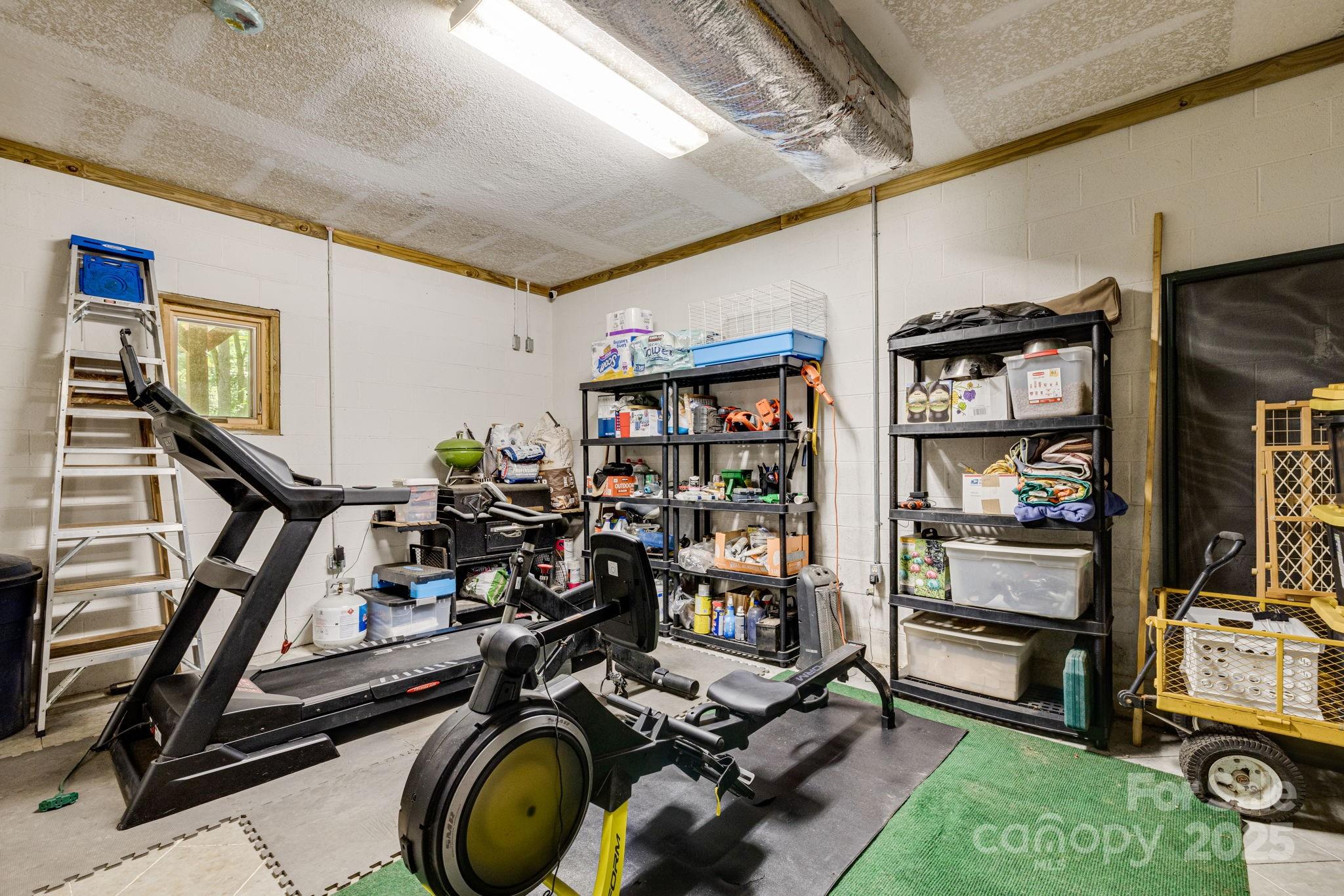 3617 Lonesome Mountain Road Marshall, NC 28753 - Photo 33 of 46 a view of a room with gym equipment