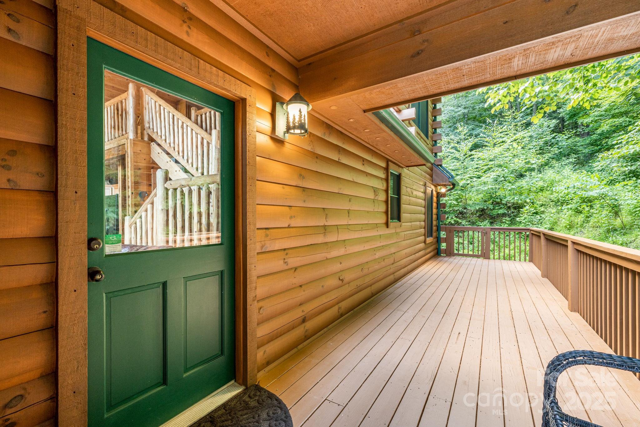 3617 Lonesome Mountain Road Marshall, NC 28753 - Photo 36 of 46 a view of balcony with wooden floor and outdoor space