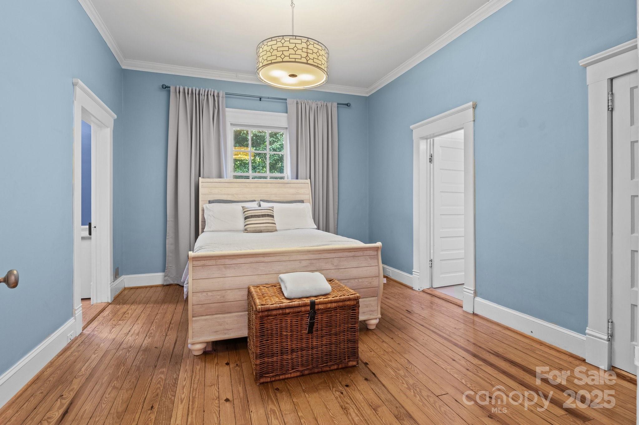 560 Concord Road Davidson, NC 28036 - Photo 24 of 34 a bedroom with a bed and a window