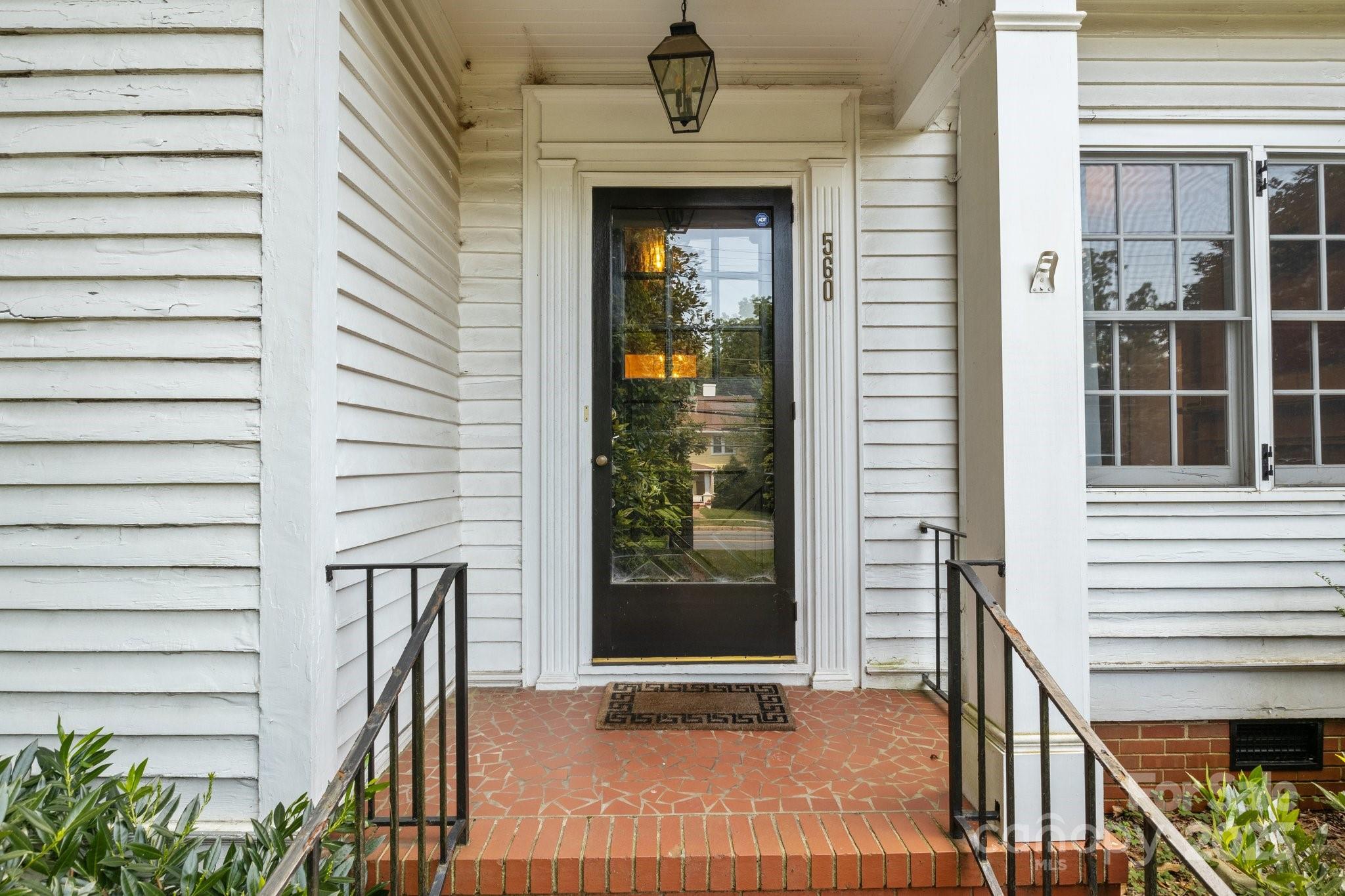 560 Concord Road Davidson, NC 28036 - Photo 6 of 34 a view of a entrance door of the house
