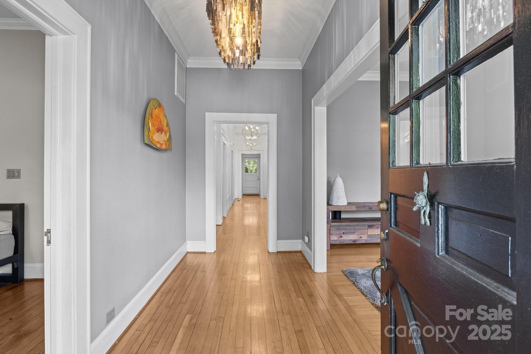560 Concord Road Davidson, NC 28036 - Photo 7 of 34 a view of an entryway with wooden floor