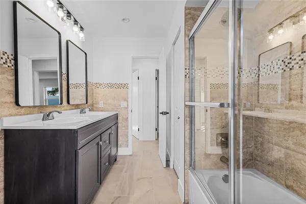 a very nice looking house with a large window