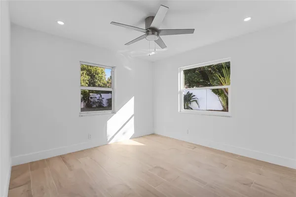 a front view of house with patio and garden