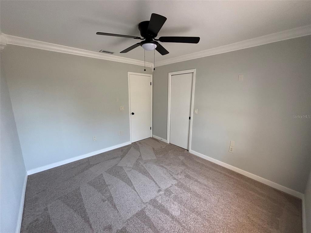 9801 Southeast Sunset Harbor Road Summerfield, FL 34491 - Photo 17 of 37 a view of empty room