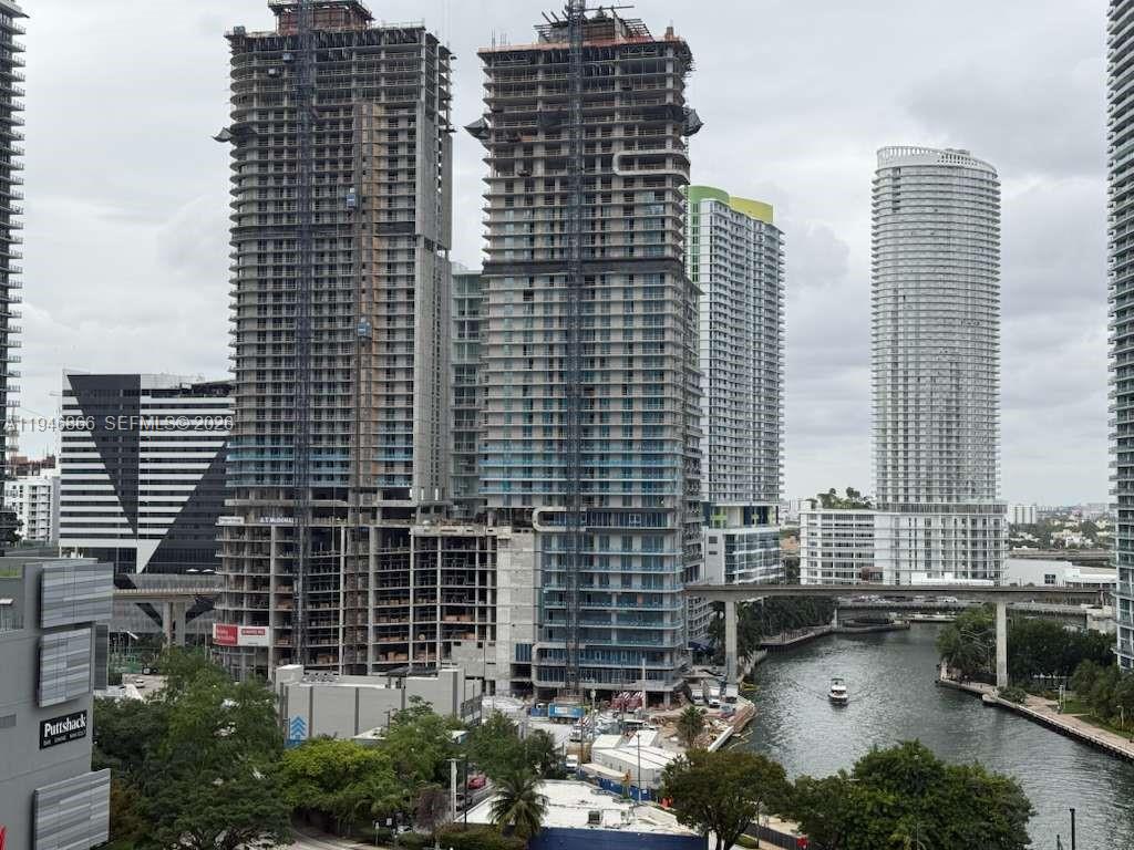 41 Southeast 5th Street, Unit 912 Miami, FL 33131 - Photo 22 of 23 a view of a city with tall buildings