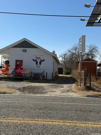 a front view of a house with a garage