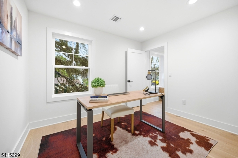 41 Orchard Road Florham Park, NJ 07932 - Photo 17 of 34 a view of a workspace with furniture and a window