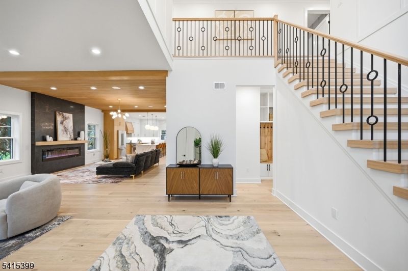 41 Orchard Road Florham Park, NJ 07932 - Photo 2 of 34 a view of livingroom with furniture and stairs